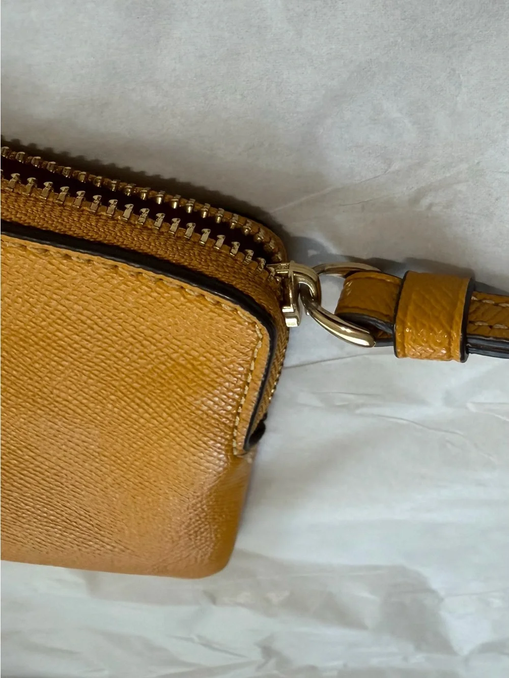 Coach Gold Leather Wristlet with Silver Logo